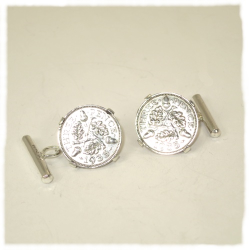 Silver 3d coins in a silver mount